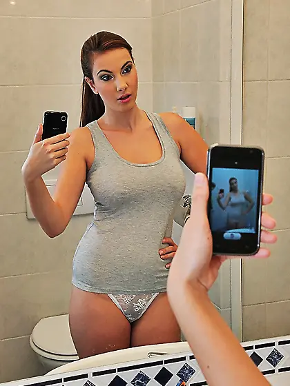 Connie Carter stripping in front of the mirror and taking selfie