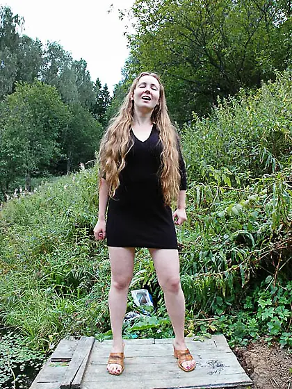 Dirty teen slut sits for a piss on a picnic...