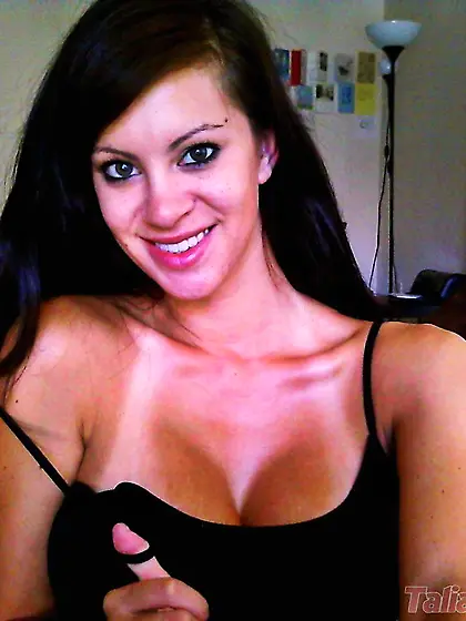 The big titted brunette Talia Shepard is sexily licking the toy