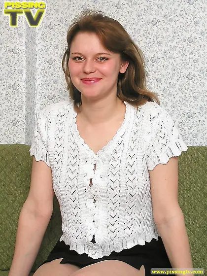 Teen blonde pissing on furniture