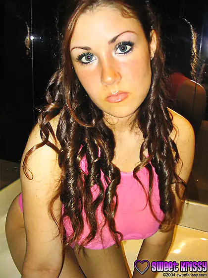 Hot teen chick Sweet Krissy takes off her pink top and shows her