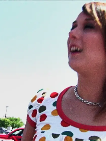 Mia Grey wears a blindfold while she orally pleases two horny hu