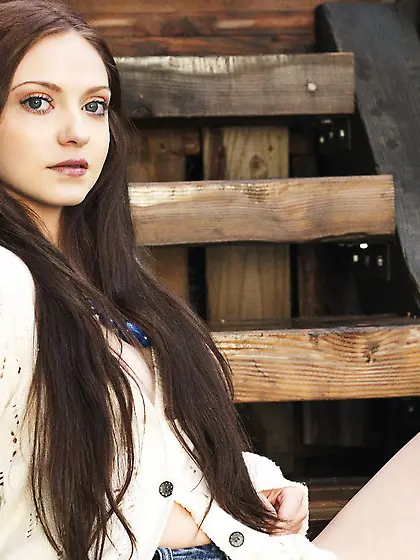 Lovely teen brunette Star Renea removes her clothes outdoors and