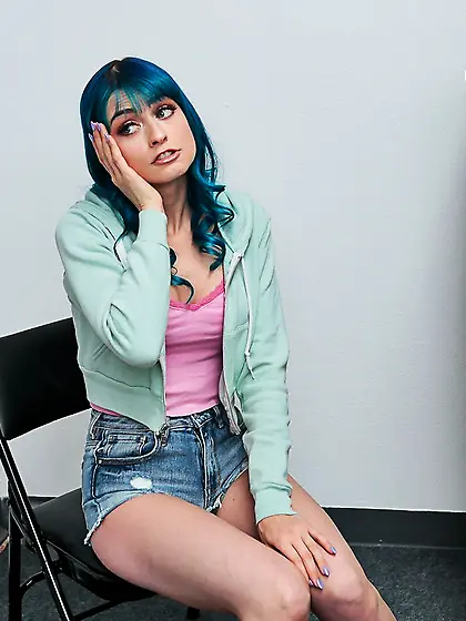 Blue-haired thief taken hard by a store guard