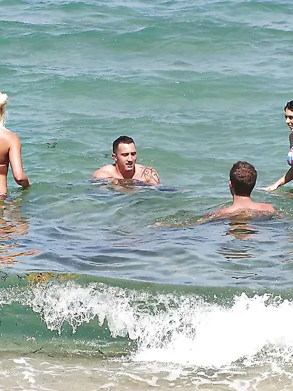 Seductive girls in bikinis like to spend good time and pose on t