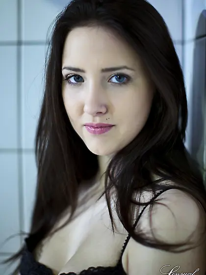 Pool isn't filled with water so the dark-haired cutie can pose n