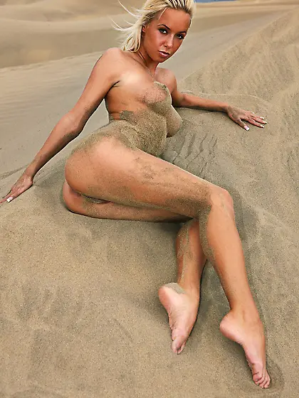 Fine looking nude blonde Natali Blond with sexy legs and tight a