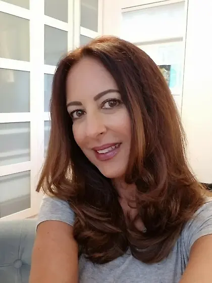 Virginia strikes a pose while showing her tits