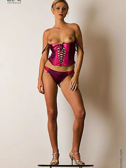 Blonde Kara Tang with silky smooth pussy keeps her legs spread a