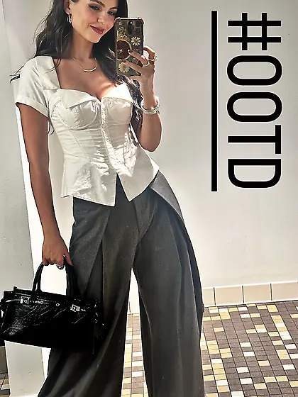 Victoria Justice in a white top