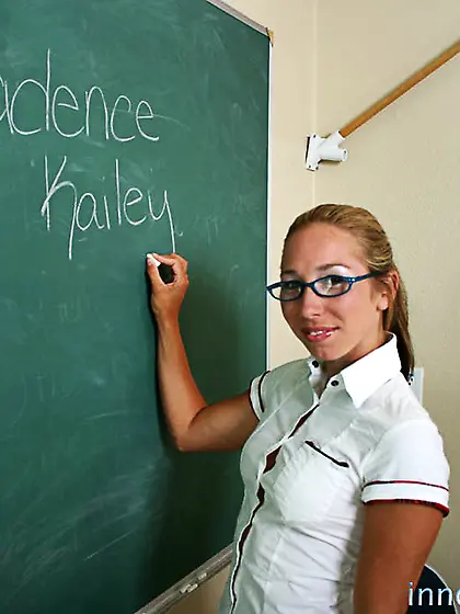 Blonde teacher blue glasses