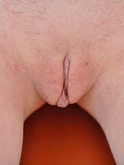 Red-haired vixen flashing her little b-hole and wet pussy as wel