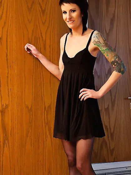 Skinny chick with a tattoo on her shoulder fools around and gets