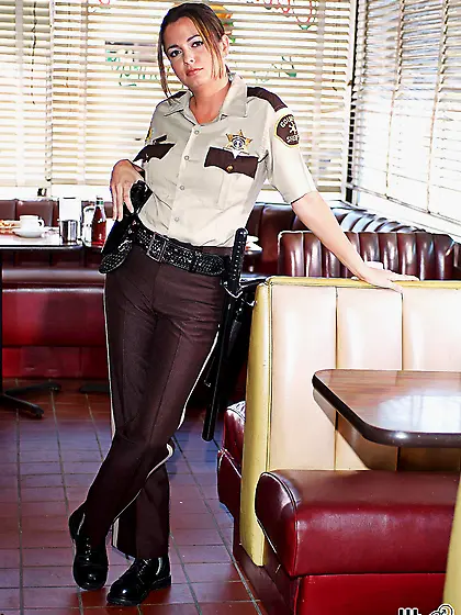 Devinn Lane the horny officer posing in her uniform and playing