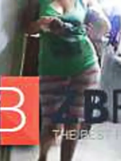 My mom walking by the building