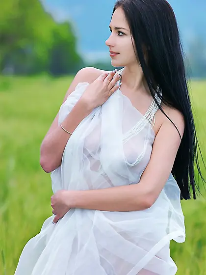 Busty model Leona E is a hot brunette who is ready to pose outdo