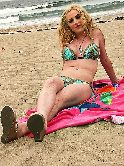 Blond shemale hottie stroking her hard cock