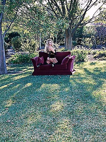 Classy blonde lady Angel Cassidy strips outdoors and teases in c