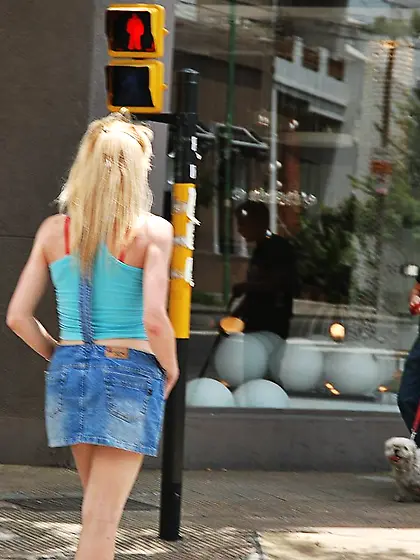 Blonde tranny goes on knees and sucks a cock