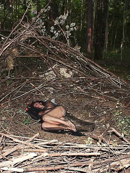 In a shroud with an apple