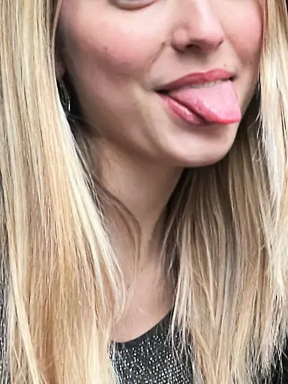 Teens tongues out