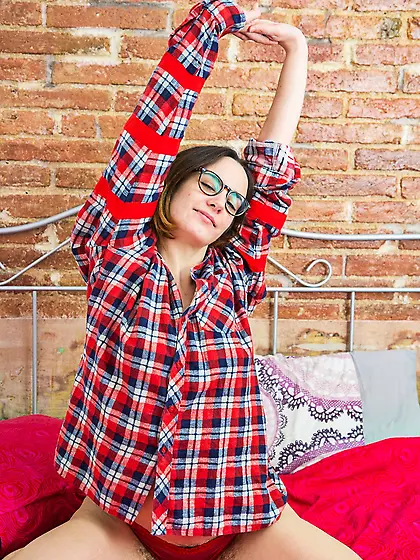 Adorable girl with a special brand of charm is showing her body