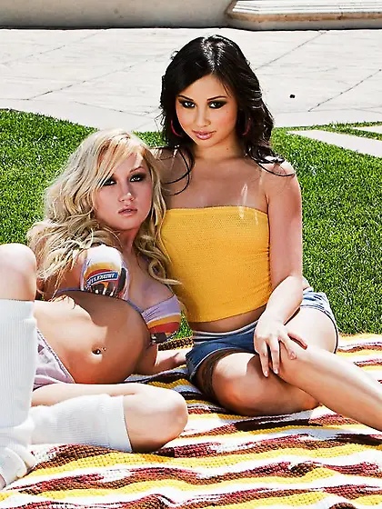 Lovely lesbos Madison Scott and Tia Tanaka get naked outdoors on