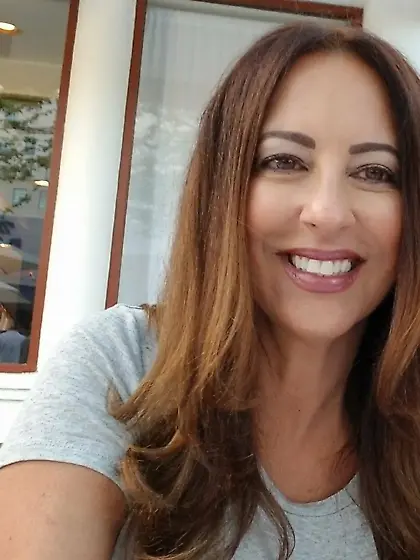 Virginia strikes a pose while showing her tits