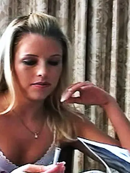 Young blonde darling sits