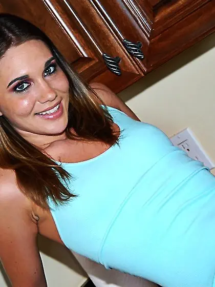 Luscious blonde Dakota Brooks shows her perfect butt and does a