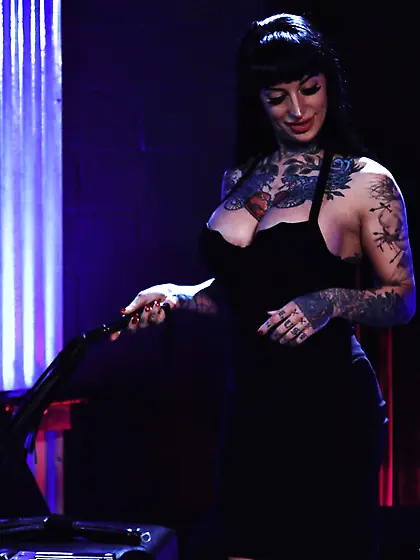 Tattooed brunette with big boobs fucks her man with a strap-on d