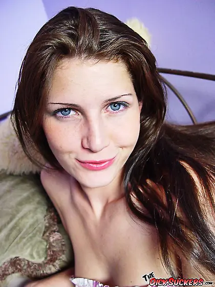Blue eyed brunette masturbates