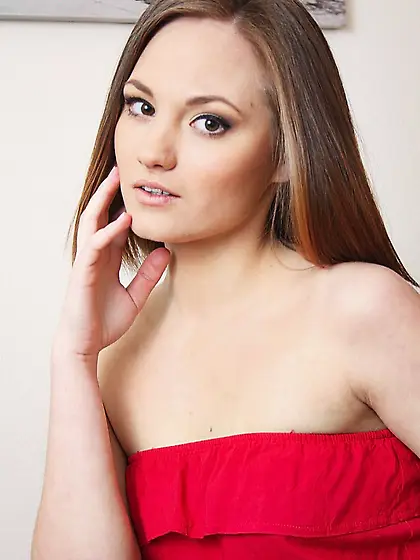 Elegant babe Ella K removes her red dress and shows us her shave