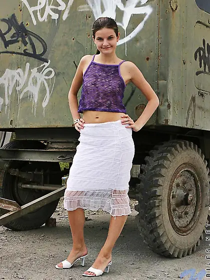 Shameless Carolina Nubile uncovers small tits and shaved cunt ri