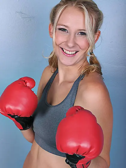 Magnetic blonde wearing grey