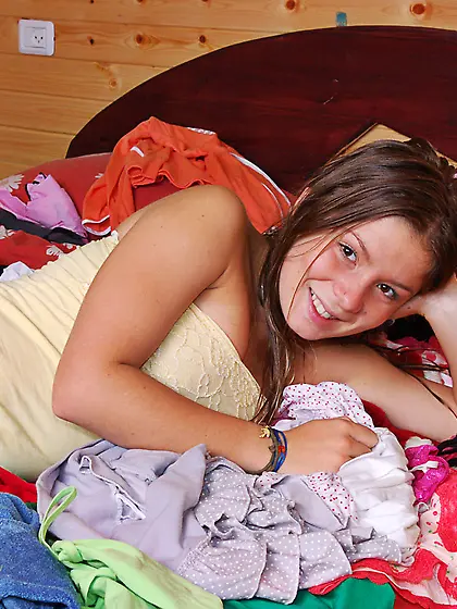 Cute teen babe Emily 18 takes off her little sexy thongs and sho