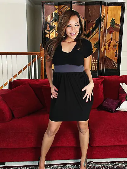 Stunning latina Stacy Welch removes her dress and poses nude on