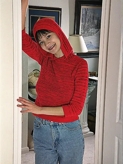 Playful Suzanne Martinez in white socks pulls down her black pan