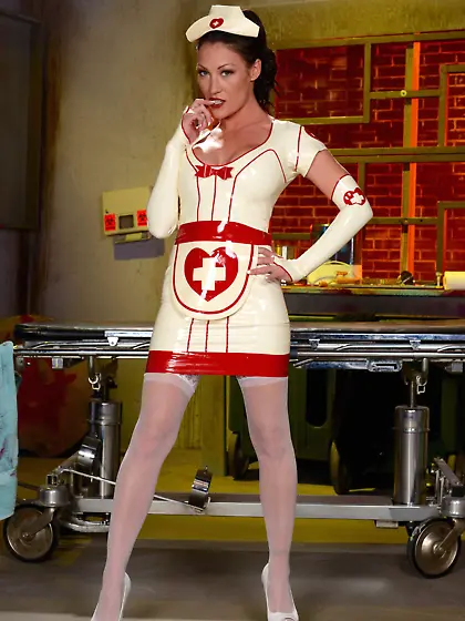 Two lustful nurses in latex get-ups and stockings fucking each o