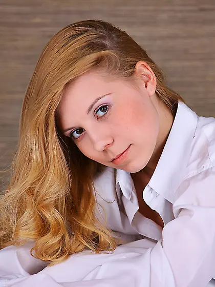 Hot blonde chick Stella D shows the big boobs and pussy between