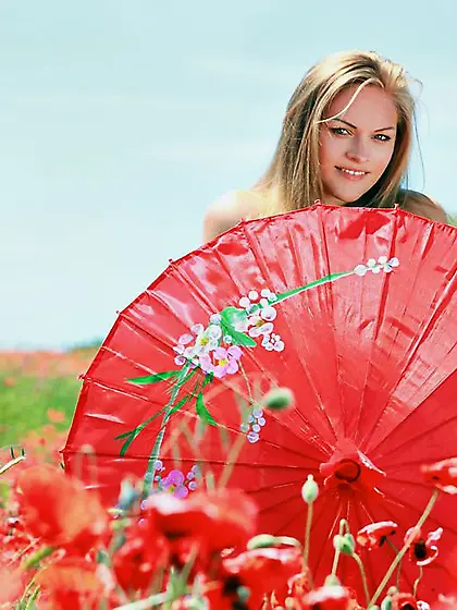 Angelic blondie with a perfect smile shows her ass from behind V