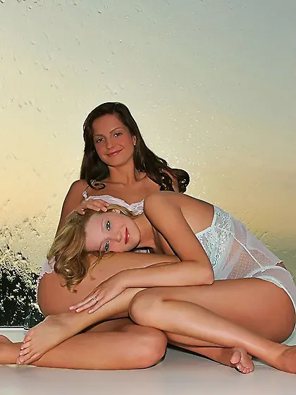 Pretty bimbo Sandra Shile touching,  smelling and petting the gir