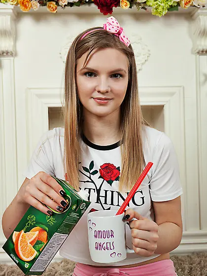 Tasty juice makes cute angel eager to remove all clothes and pos