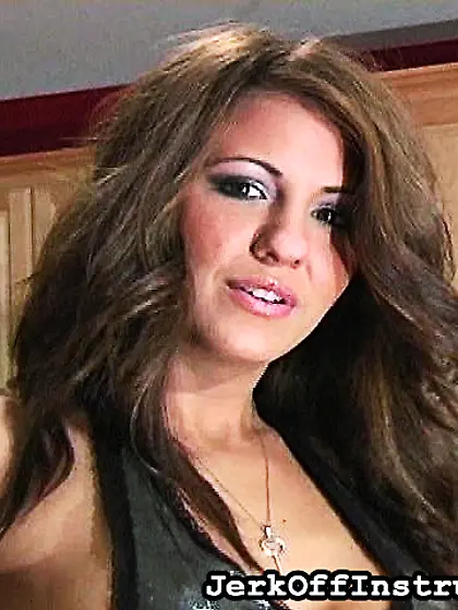 Busty dame in black pantyhose poses in the...