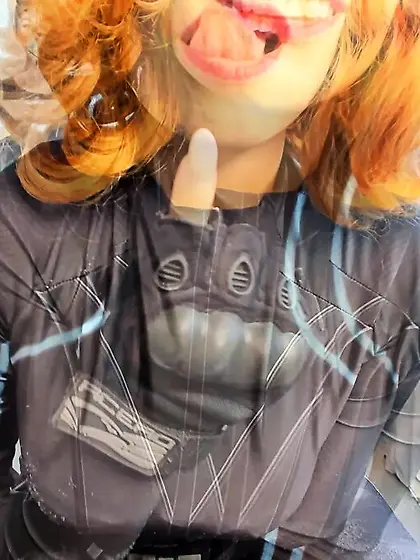 Busty redhead uses a toy on her plump pussy