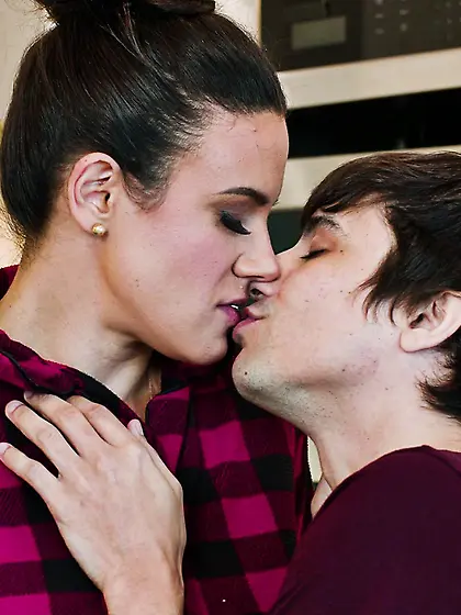 Penny Barber fucks her nerdy stepson in the kitchen