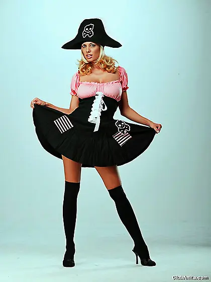 Naughty pirate babe Anita Dark strips her mini skirt and teases