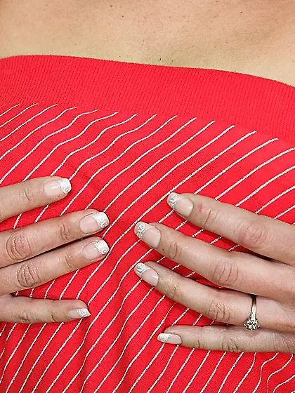 Fair haired milf Lilian Karups strips naked and inserts two fing