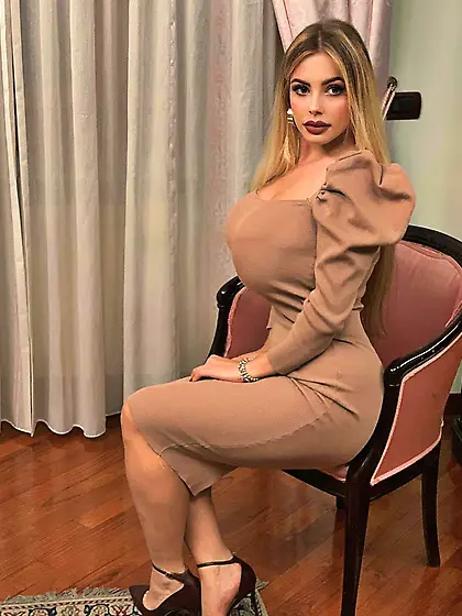 Italian blonde with huge tits