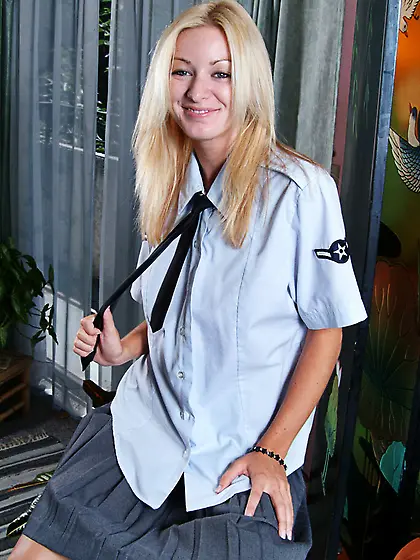 Blond cutie in uniform Sarah Sinn bares her tits and then expose